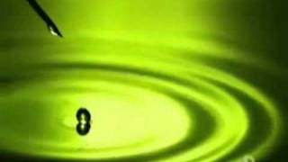 Drop of water floating on water in slow-motion