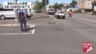 自転車の高齢女性