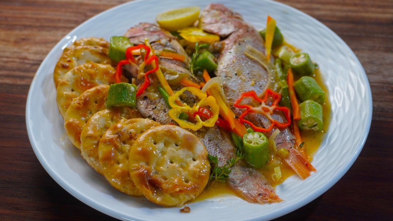 How to Make Authentic Jamaican Steamed Fish with Coconut and Crackers!