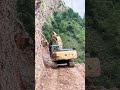 Powerful Hyundai Excavator Working on Mountain Road Construction