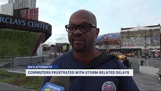 Frustrated NYC commuters lie in wait as Ida impact halts subway trains
