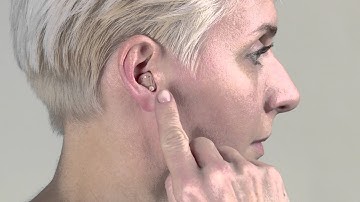 Adjusting the volume on your custom hearing aid