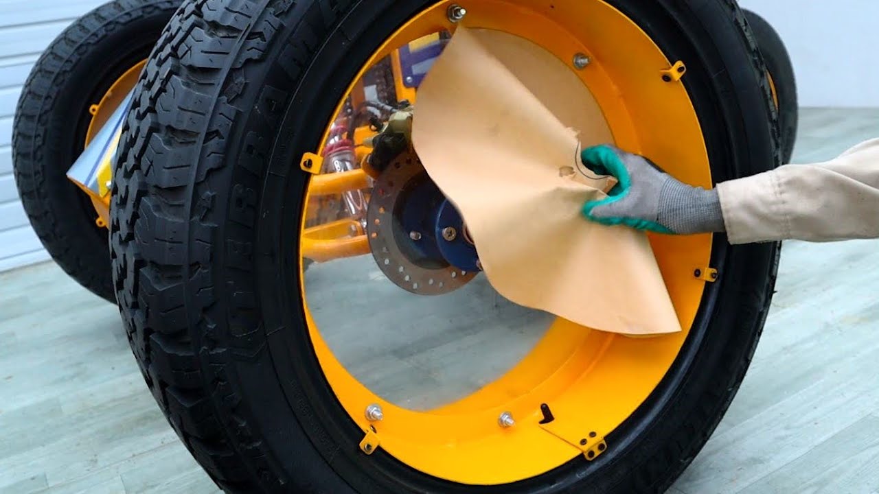 потрясающий трехколесный велосипед с прозрачным ободом и мощным двигателем объемом 350 куб. см