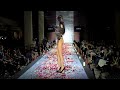 Models TRIP & FALL on petal covered catwalk during the Emilia Vishnevskaya "Couture Lingerie&