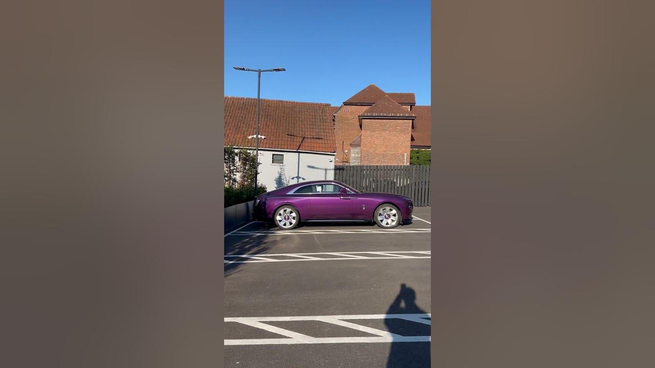 A true statement RollsRoyce in purple with chrome accents everywhere