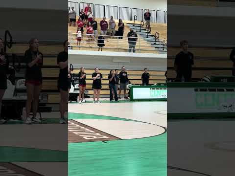Gracyn singing the national anthem for the first time in the new gym.