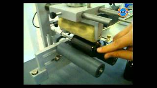labelling machine for wraparound application on BOTTLES.avi
