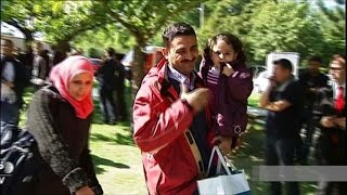 Refugees from Iraq, Syria arrive north-west of Paris