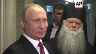 Putin and patriarch open new church in monastery