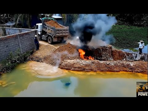 Dump Truck 5 Ton Unloading Stone Pour into deep Pond​, Powerful Bulldozer KOMATSU D21P