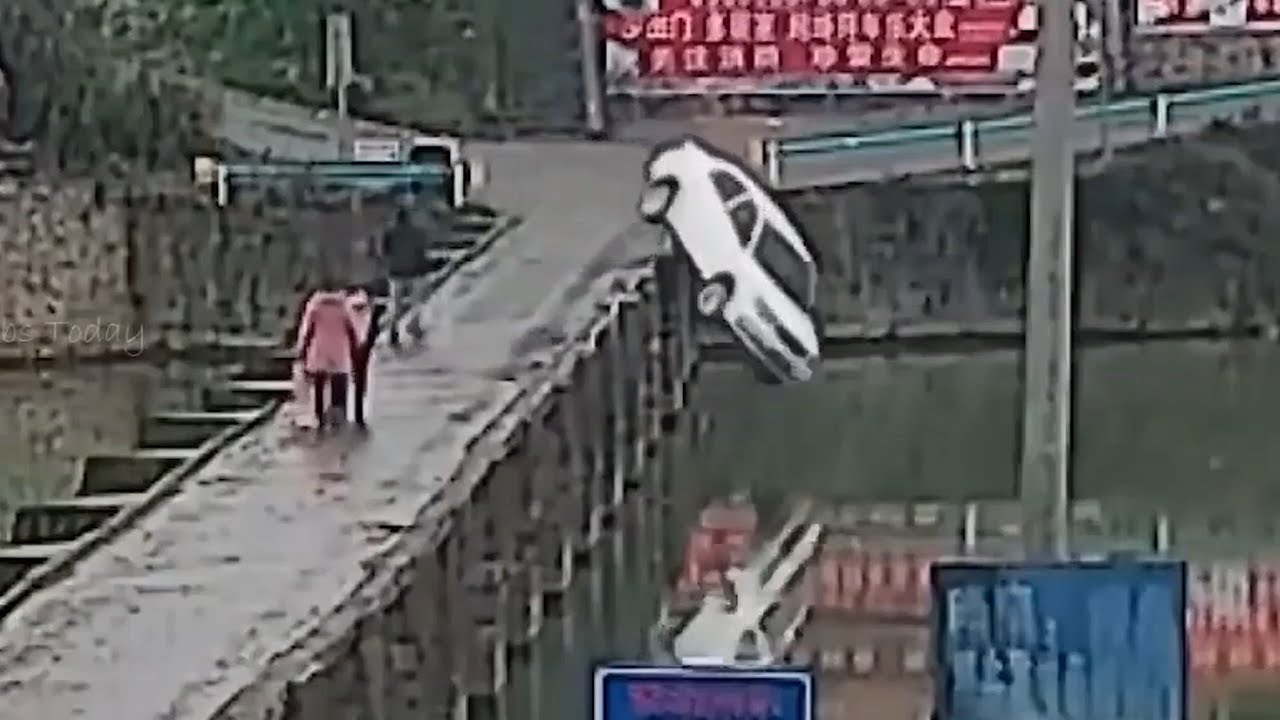 Car Sends Itself Flying Off A Bridge - YouTube