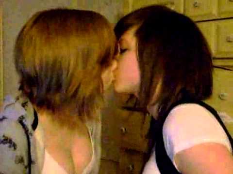 Young interracial lesbian couple love kissing photos