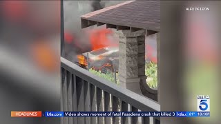 City trash truck bursts into flames, chars parked cars