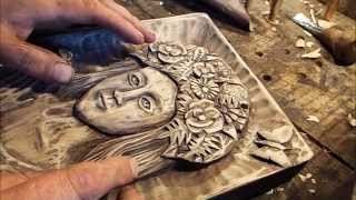 Woodcarving.a picture is a woman person Панно, рельефная резьба по дереву. Женское лицо.