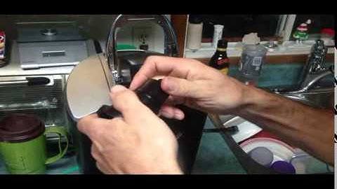 How to Fix or Repair a clogged Keurig coffee maker with a paper clip.