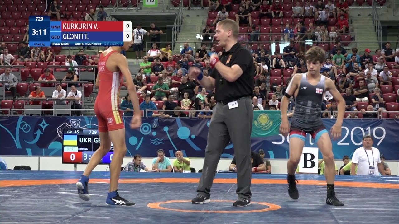 BRONZE GR - 45 kg: V. KURKURIN (UKR) v. T. GLONTI (GEO)