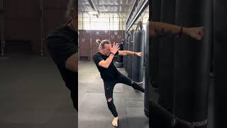 Muay Thai Lateral footwork into the low kick by Ajarn Sam Adams WTBA