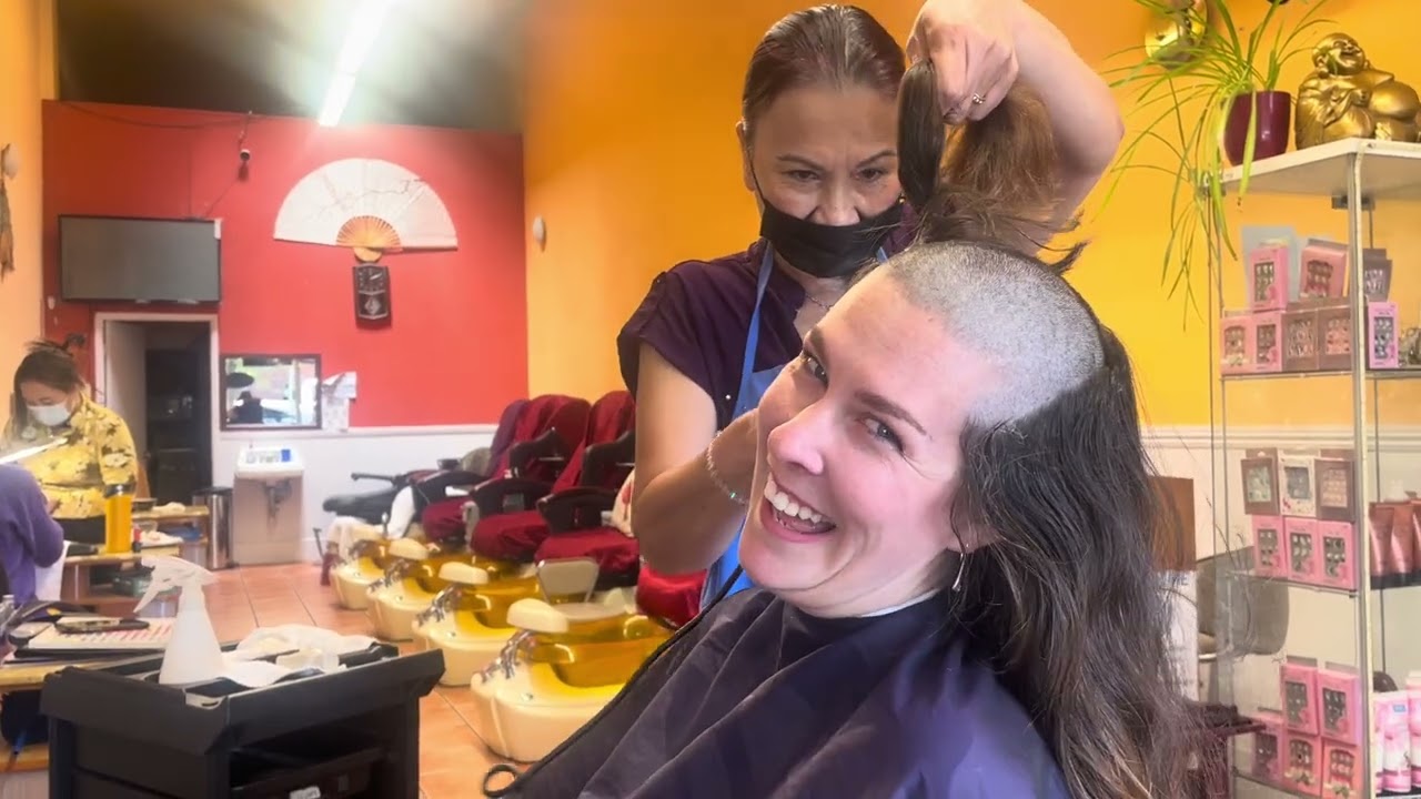 she ran the clippers right down the middle! #longtobald #headshavegirl #salonmakeover #longtoshort