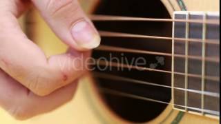 View Of Hand Playing Guitar 2 - Stock Footage Hive 15754625