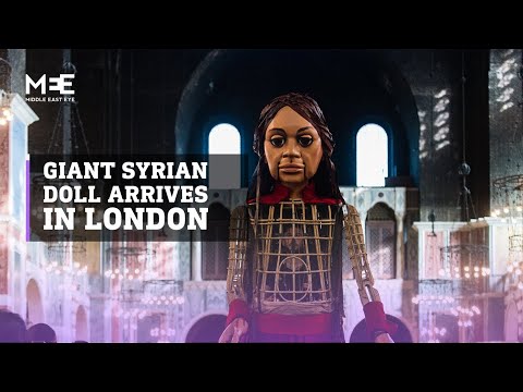 Giant refugee puppet