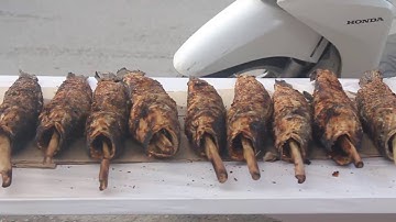 Người Sài Gòn đổ xô mua cá lóc nướng cúng thần tài