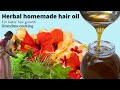 Grandma makes herbal hair oil  village style  homemade hair oil for strong  dense hair