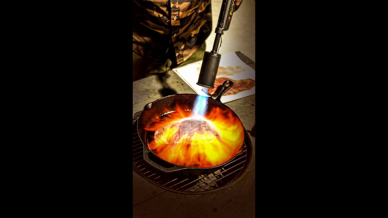 Cooking a steak with a Flamethrower shorts YouTube