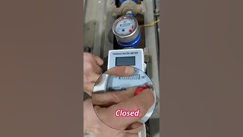 Smart water meter close valve on magnet attack
