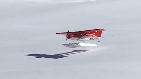 E flite Maule M7 2nd flight of the day on floats off of snow!