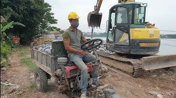 Máy xúc múc đá lên công nông ba bánh tự chế