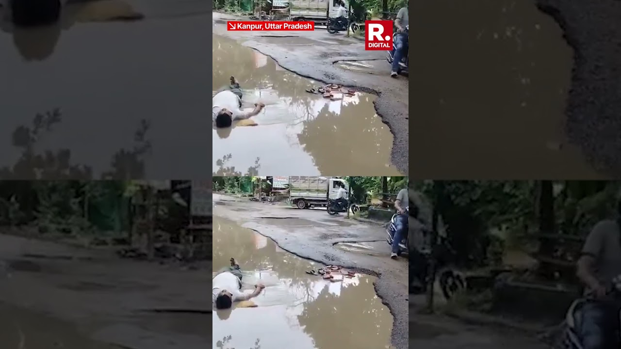 Kanpur Father Protests in Pothole After Daughter Falls In