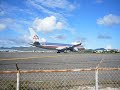 Saint Martin/Sint Maarten SXM Takeoff - Holding Onto the Fence Right Behind A Jet At 100% Power