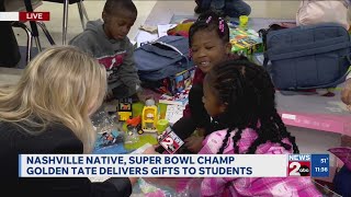 Golden Tate delivers gifts to students