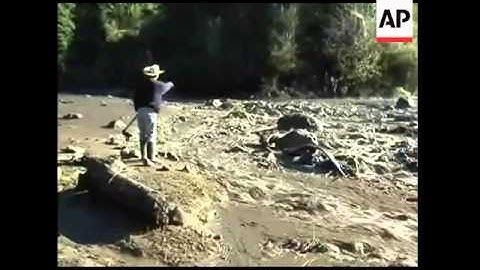 Town partially buried by landslides, 11 dead