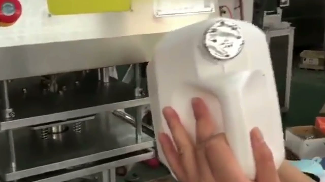 Tabletop semi automatic lubricant jerry can foil sealing closing machine