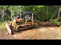 Salvaged Td9 Bulldozer Winching dead trees from the Forest for Firewood.