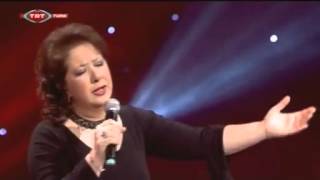 Emel Taşçıoğlu - Çamlığın Başında Tüter Bir Tütün Resimi