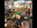 Riot police push back crowd trying to get close to Macron at farmers' fair