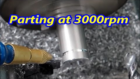 CNC lathe drills with cnc stub drill, then parts off 4 washers using Kennametal 1.6 groove tool