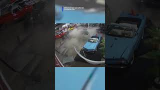 Driver slams into classic car collection