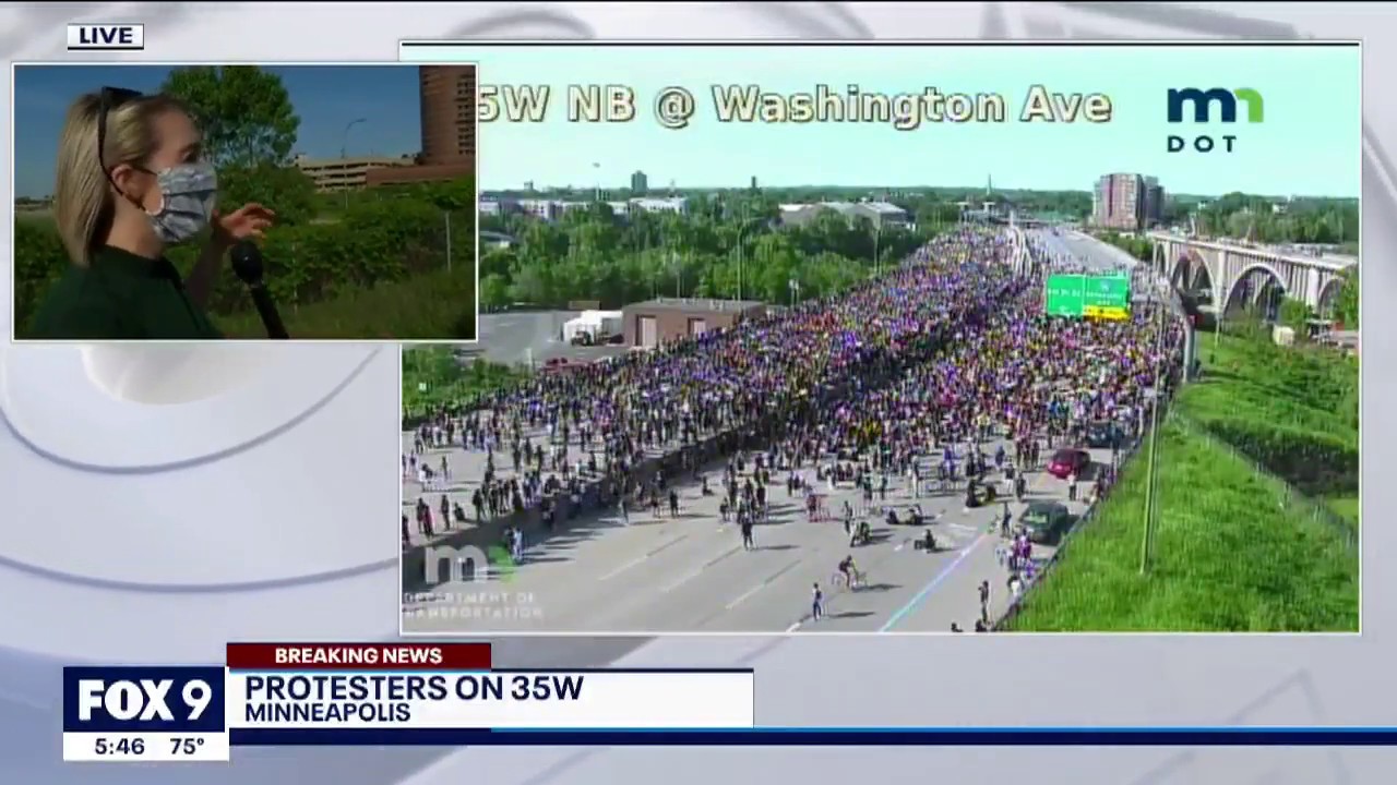 Truck drives through crowd of protesters blocking I-35W in Minneapolis