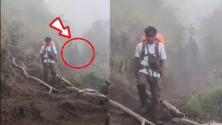 Two of us were descending from the top of a mountain, but suddenly a black figure appeared behind...