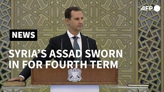 Syria's Assad takes oath after criticised re-election | AFP