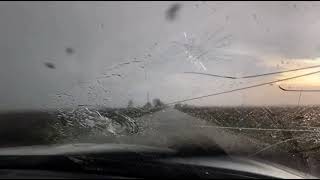 Surprise Hailcore hit shatters my windshield in Illinois on a Confirmed damaging tornado warning.