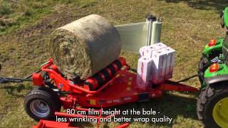 KUHN RW1610 e-Twin - Round bale wrappers (In action)