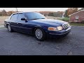 CROWN VIC GETS DROPPED ON COILOVERS! lowering the vic