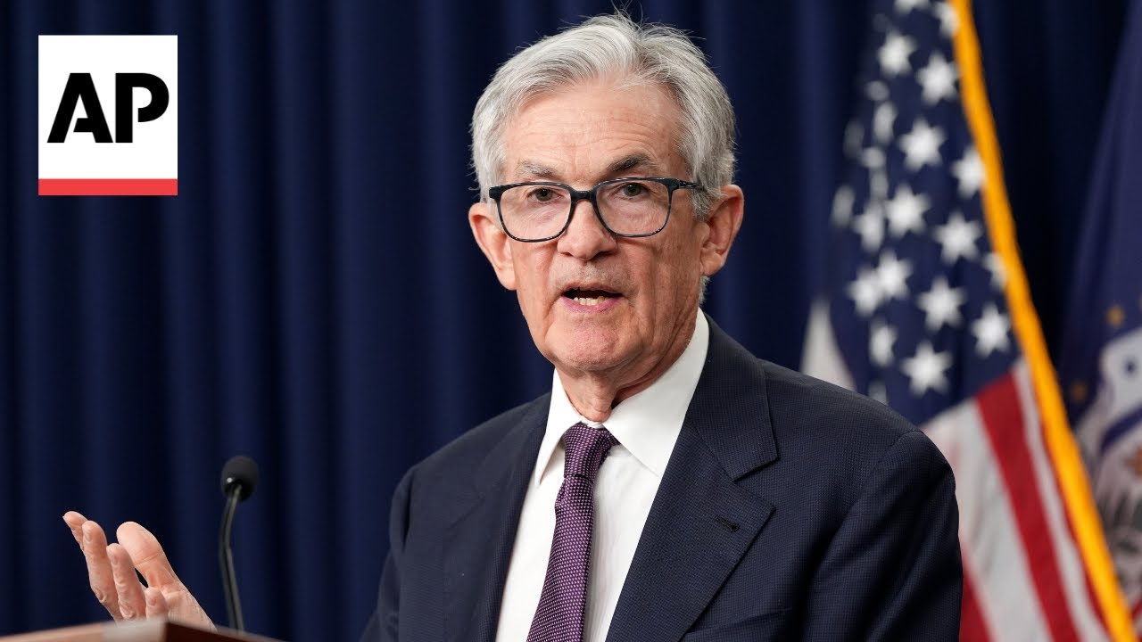 Federal Reserve cuts its key interest rate by a quarter-point - YouTube
