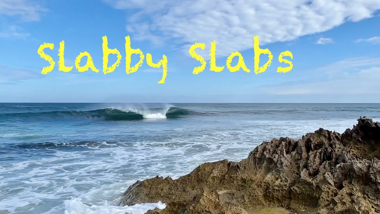 Shallow slab surf session at the island.