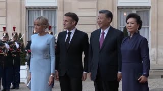 Chinese President Xi and his wife at Elysee Palace in Paris for state dinner