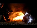 Bonfire,  armor couter and guitar music. Nikon D7500 night video.